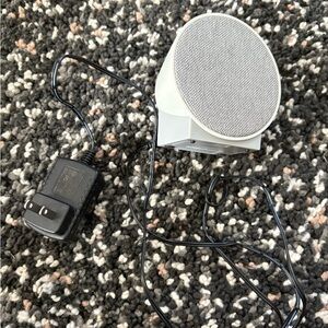 Compact Gray alarm clock with plug in